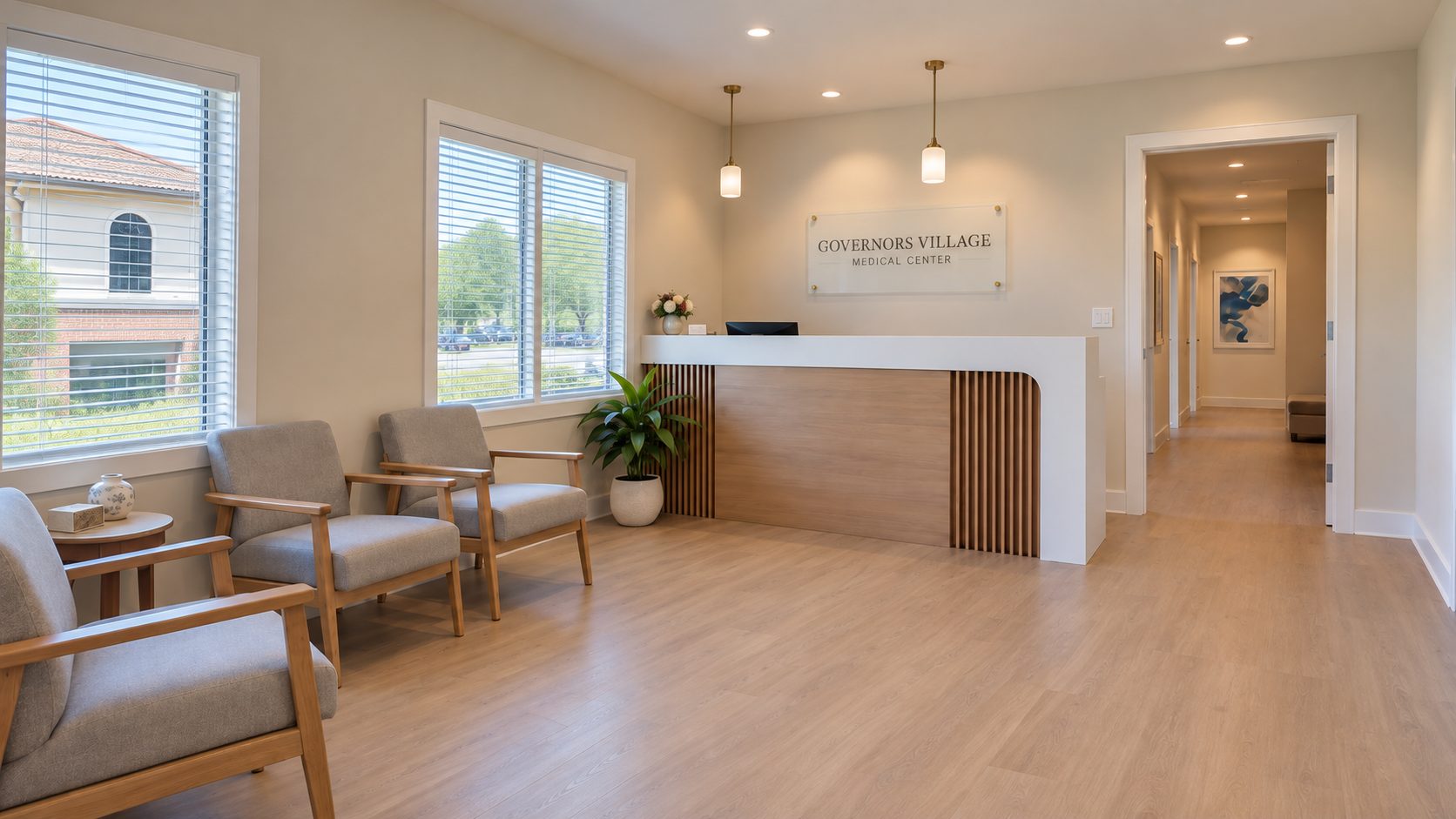 Reception area at Governors Village Medical Center with waiting room seating and front desk